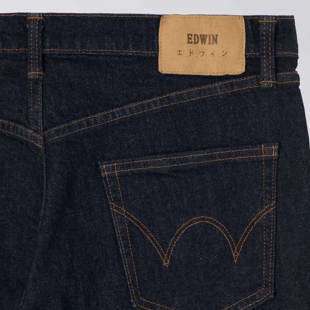 SLIM TAPERED BLUE RINSED JEANS 