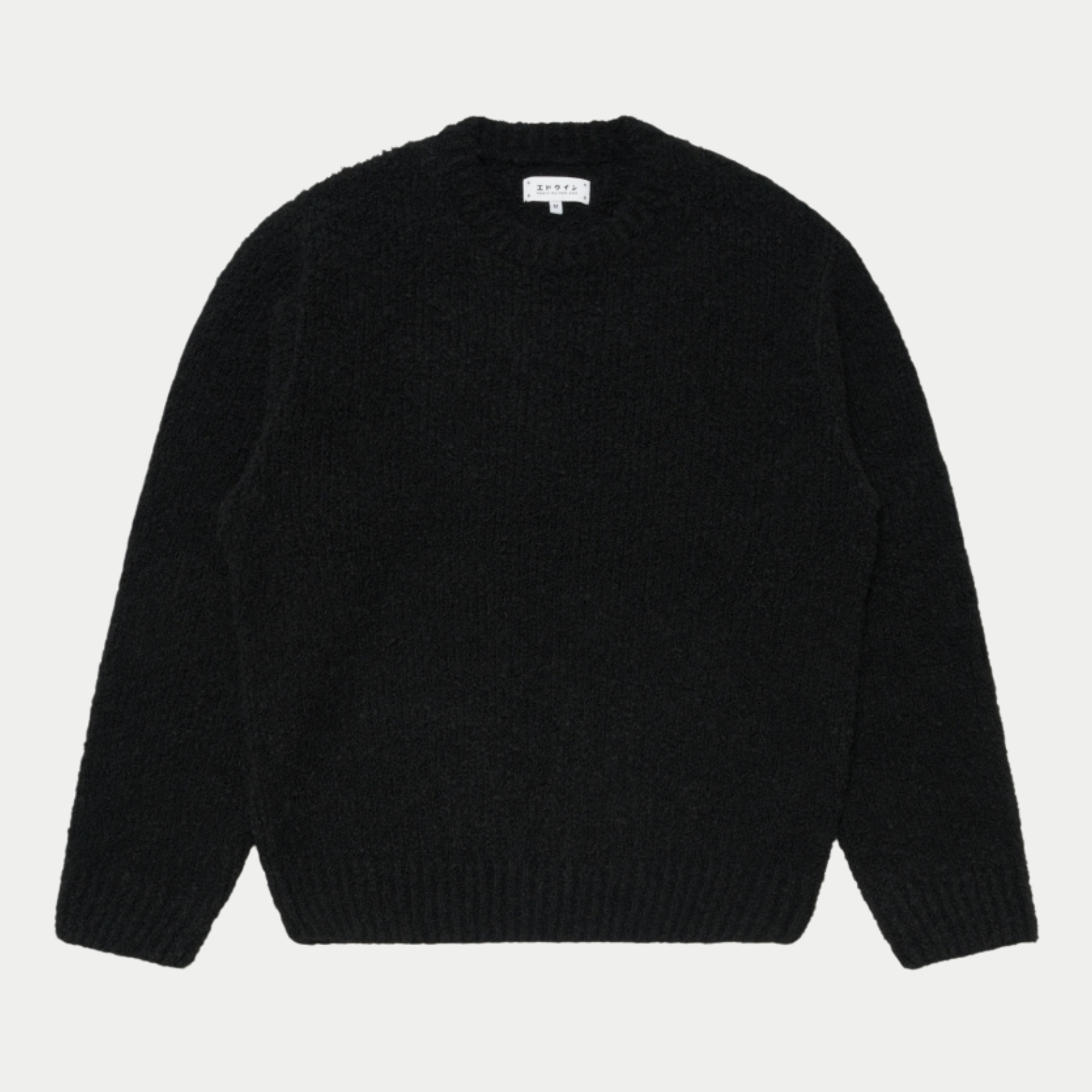 Pull Dun Edwin noir en maille bouclette, vue de face à plat, encolure ronde bordée et bas de corps côtelé