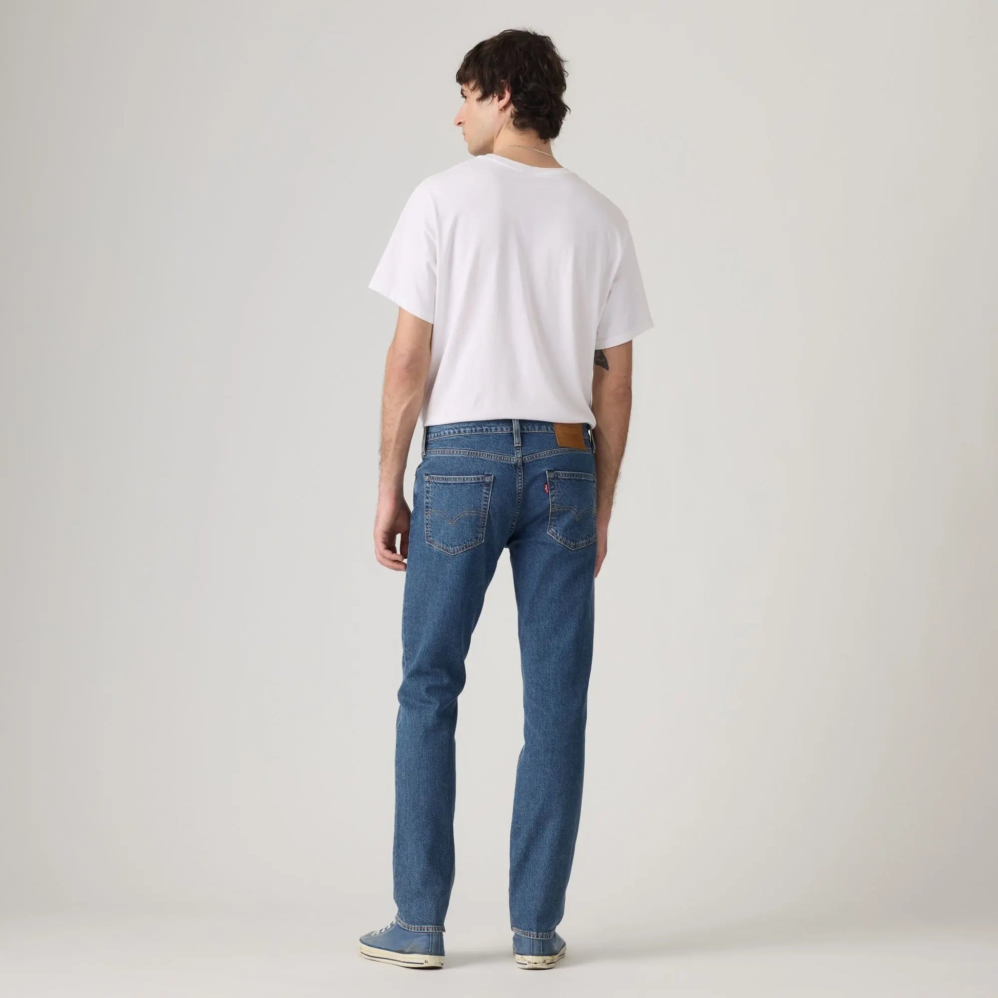 Jean Levi's 511 Slim Laugh It Off porté de dos : poches arrière, patch cuir et étiquette rouge Levi's