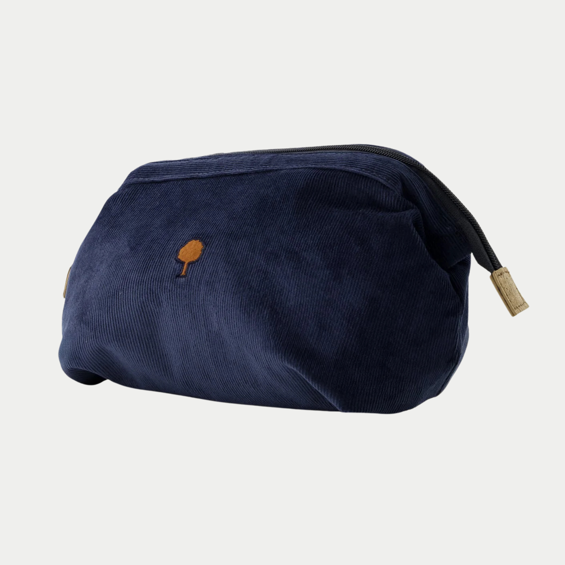 Trousse de toilette Faguo velours côtelé bleu marine de trois quarts, tirette zippée à embout beige naturel