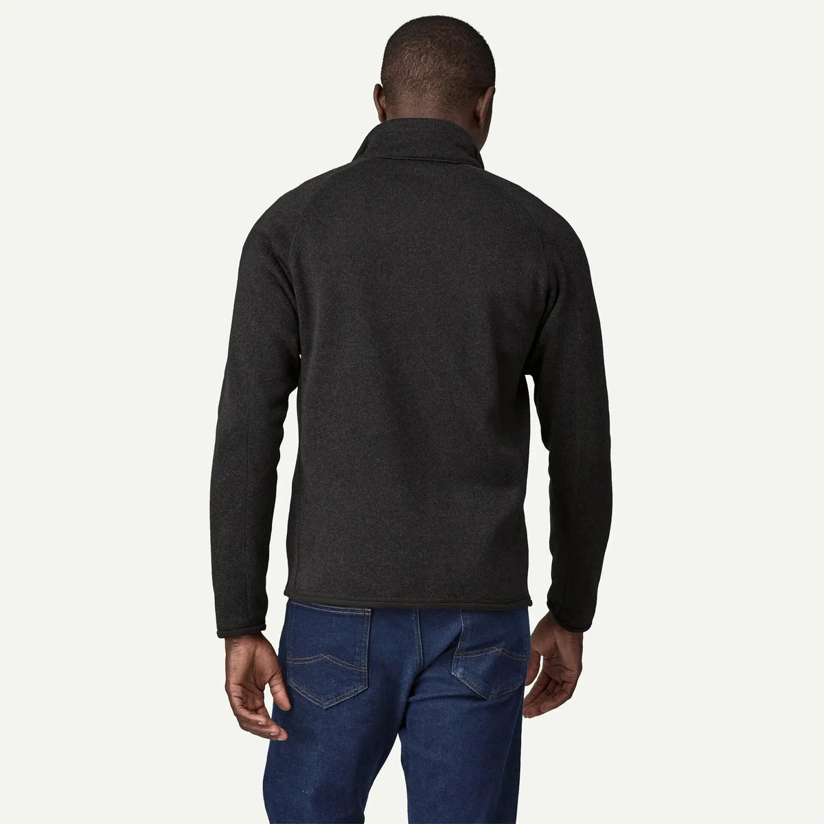 Better Sweater noir vu de dos, épaules raglan et maille anthracite chinée
