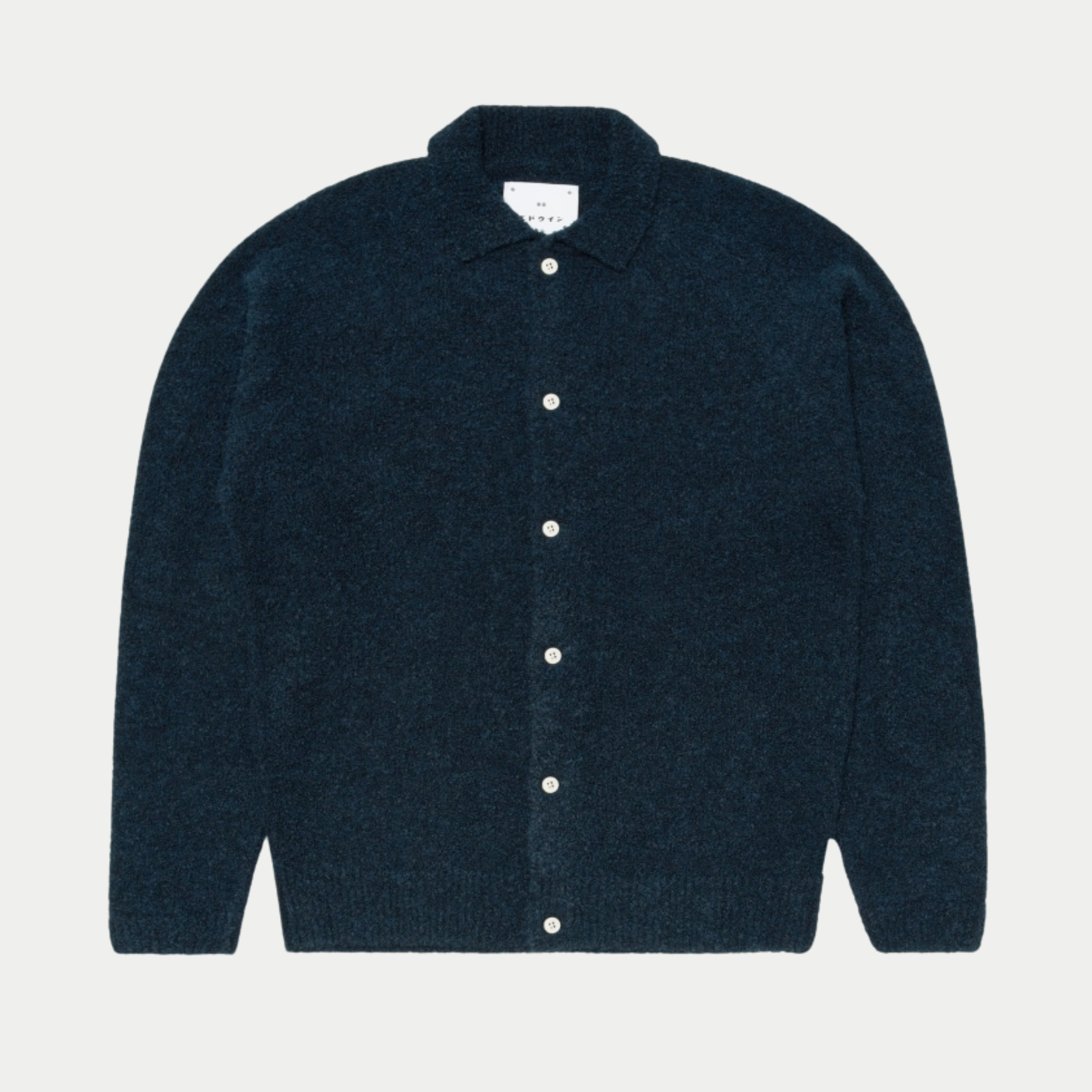 Cardigan Gemini bleu marine Edwin à plat de face, col chemise, boutons ivoire et ourlet côtelé