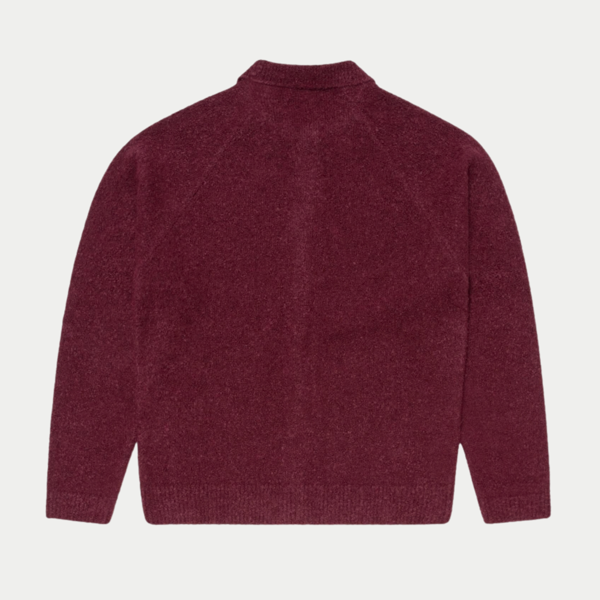 Cardigan Gemini Edwin bordeaux à plat de dos, coutures raglan et bas côtelé en maille bouclette