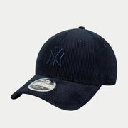 Trois quarts : velours côtelé bleu marine, logo NY brodé ton sur ton