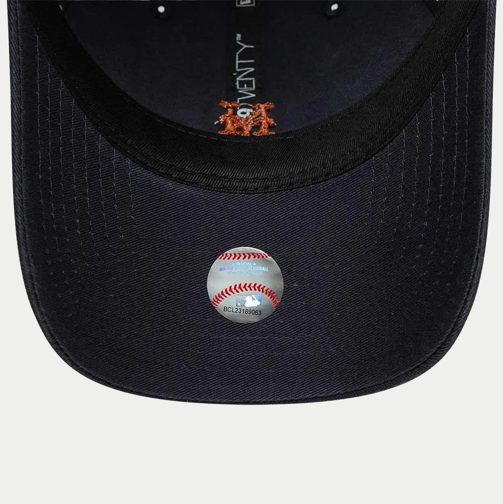 Dessous de visière bleu marine, bandeau noir, envers du mini logo Mets orange et pastille MLB officielle