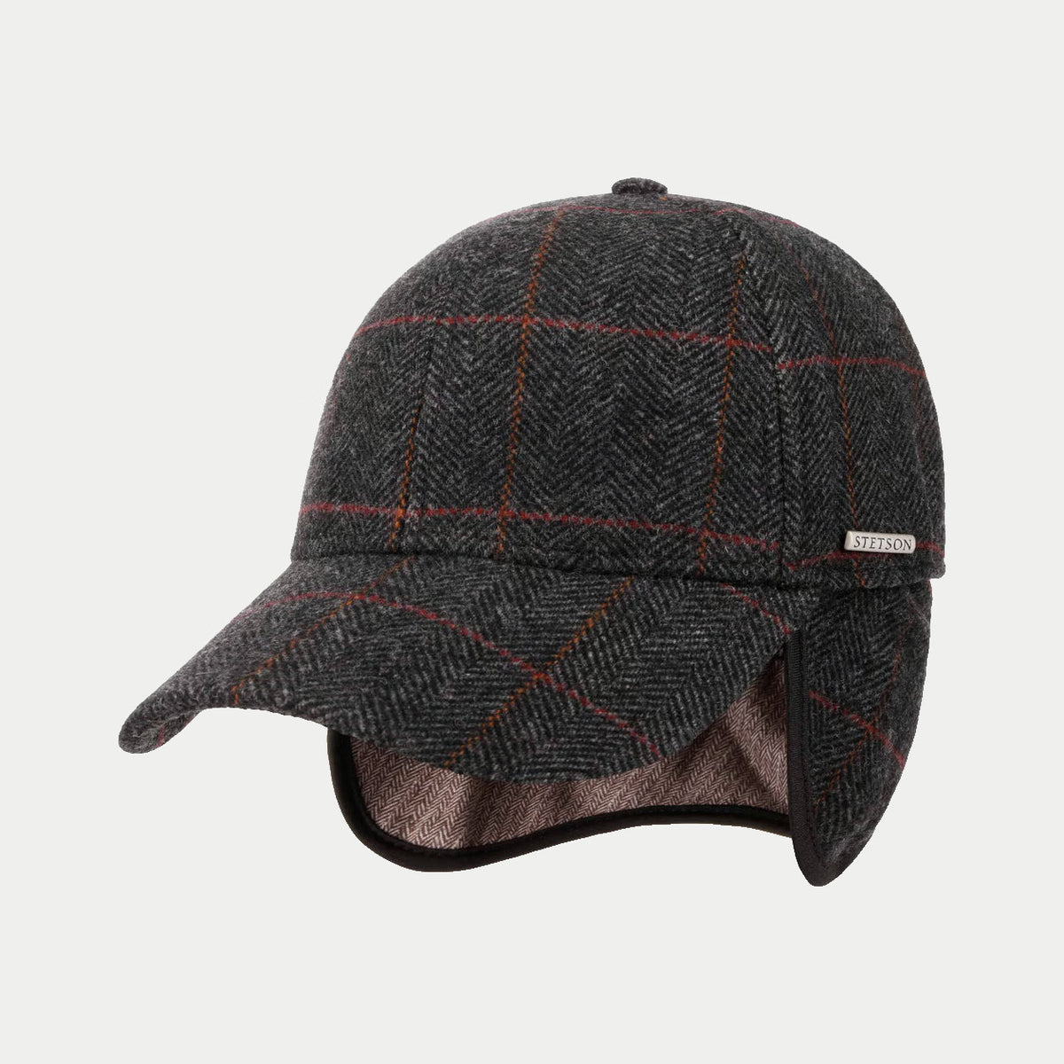 Casquette Kinty Stetson grise en laine à chevrons, vue de trois quarts avec les cache-oreilles rabattus
