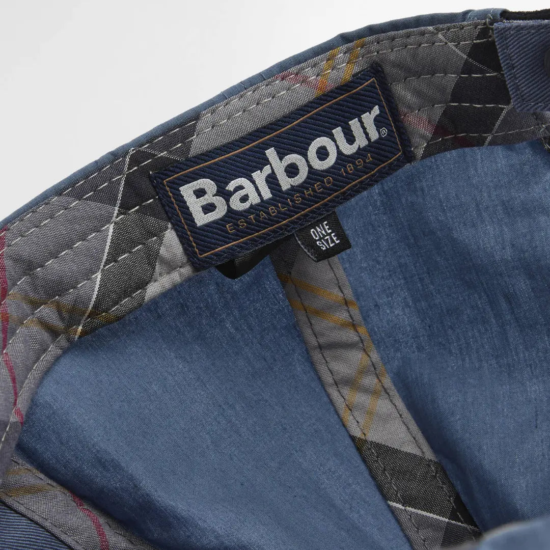 Étiquette Barbour taille unique cousue sur la doublure à carreaux gris et rouge