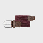 Ceinture tressée Lie de Vin enroulée : tressage uni bordeaux profond, boucle argentée et embouts de cuir marron