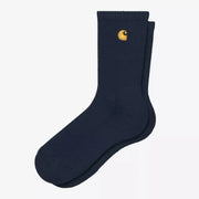 Chaussettes Chase bleu marine présentées à plat : tige côtelée mi-mollet, bord-côte élastique et logo C brodé doré