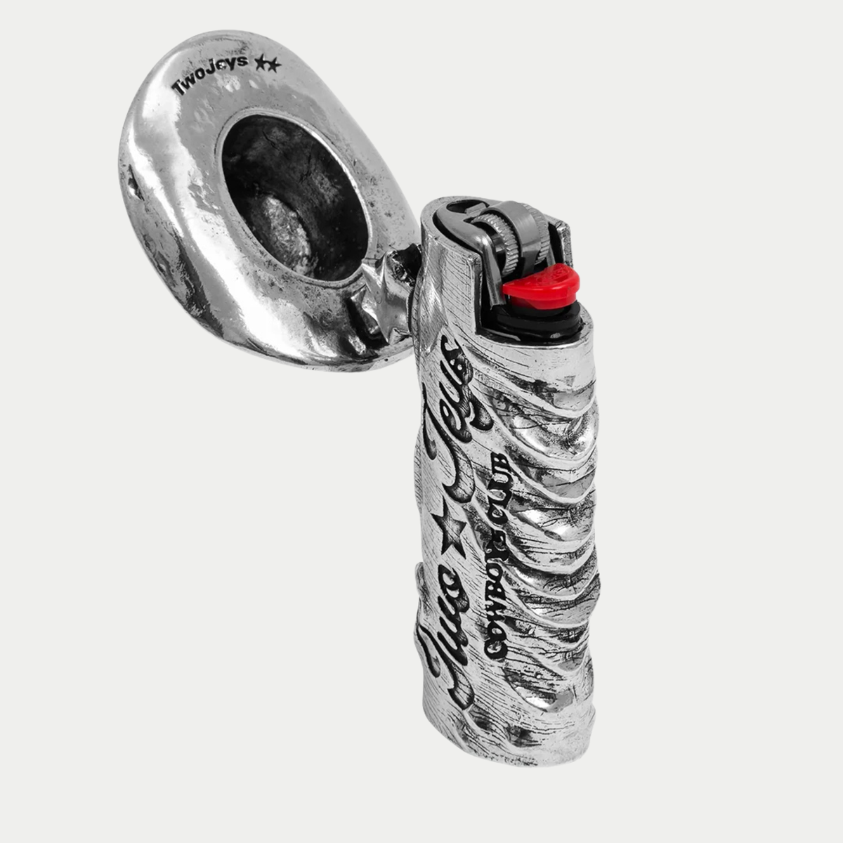Étui à briquet Icon Twojeys - chapeau de cowboy ouvert sur sa charnière, briquet visible