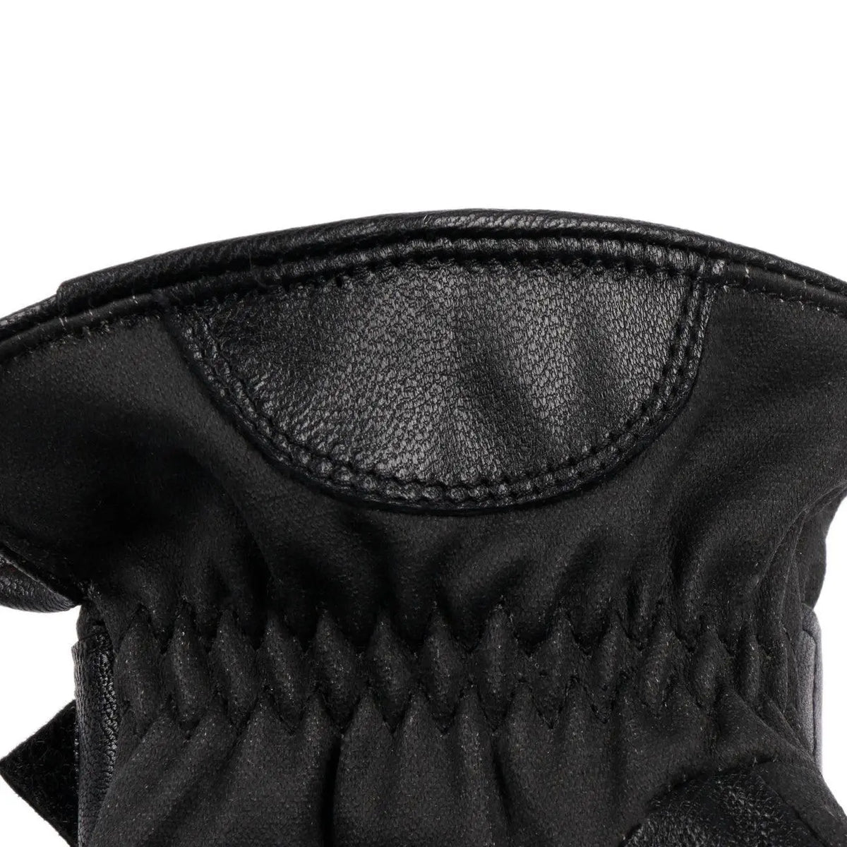 Empiècement cuir et fronces élastiques au poignet du gant noir