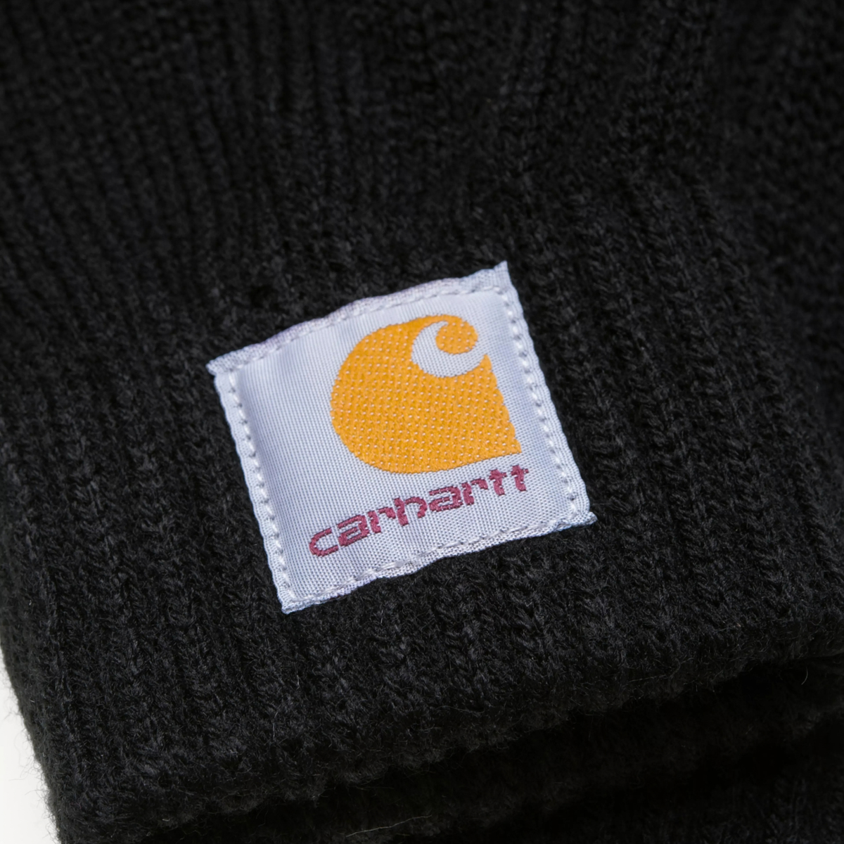 Gants Watch Noir Carhartt WIP - gros plan sur le Square Label cousu au poignet côtelé