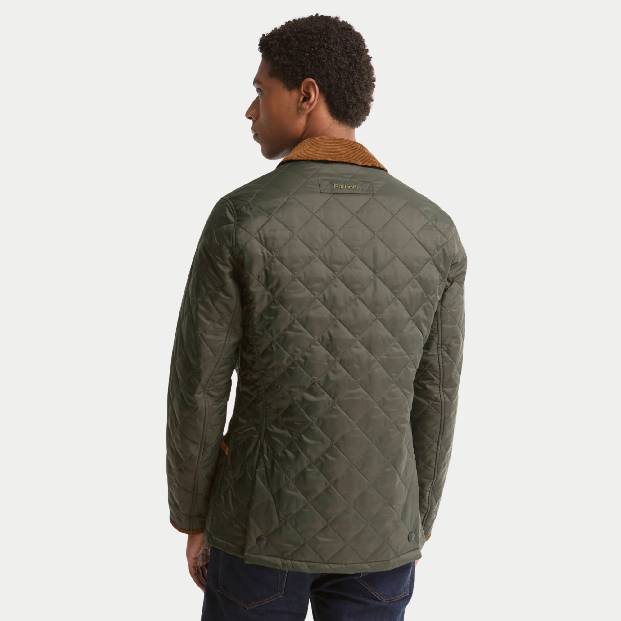Dos de la veste Icons Heritage Liddesdale Sage Barbour, matelassage losange, patch Barbour brodé et fentes à pression