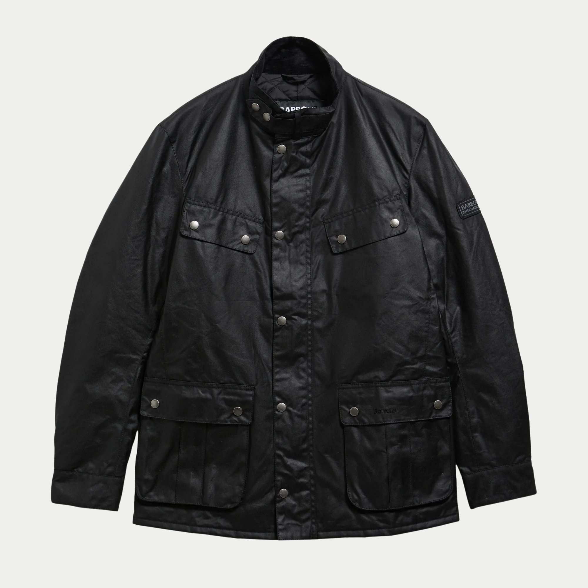 Veste cirée Duke noire Barbour International à plat, doublure matelassée visible sous le col montant