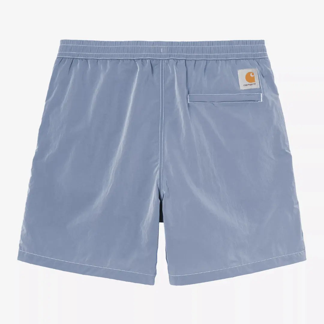 Dos du maillot Canby bleu ardoise : taille élastiquée, poche passepoilée surpiquée de blanc, label carré
