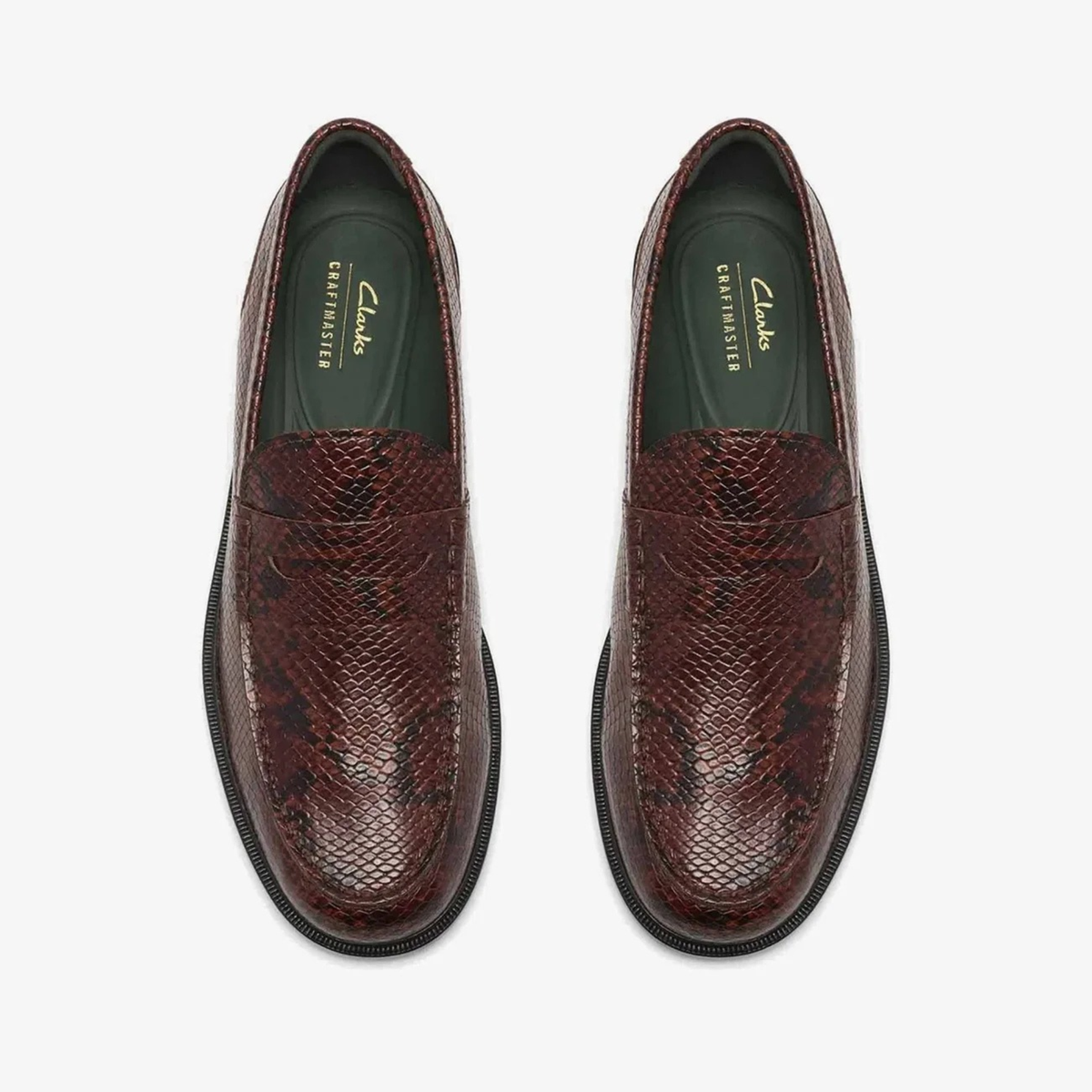 Paire de mocassins Craft James Lo imprimé serpent vue de dessus, première en cuir vert foncé marquée Clarks Craftmaster