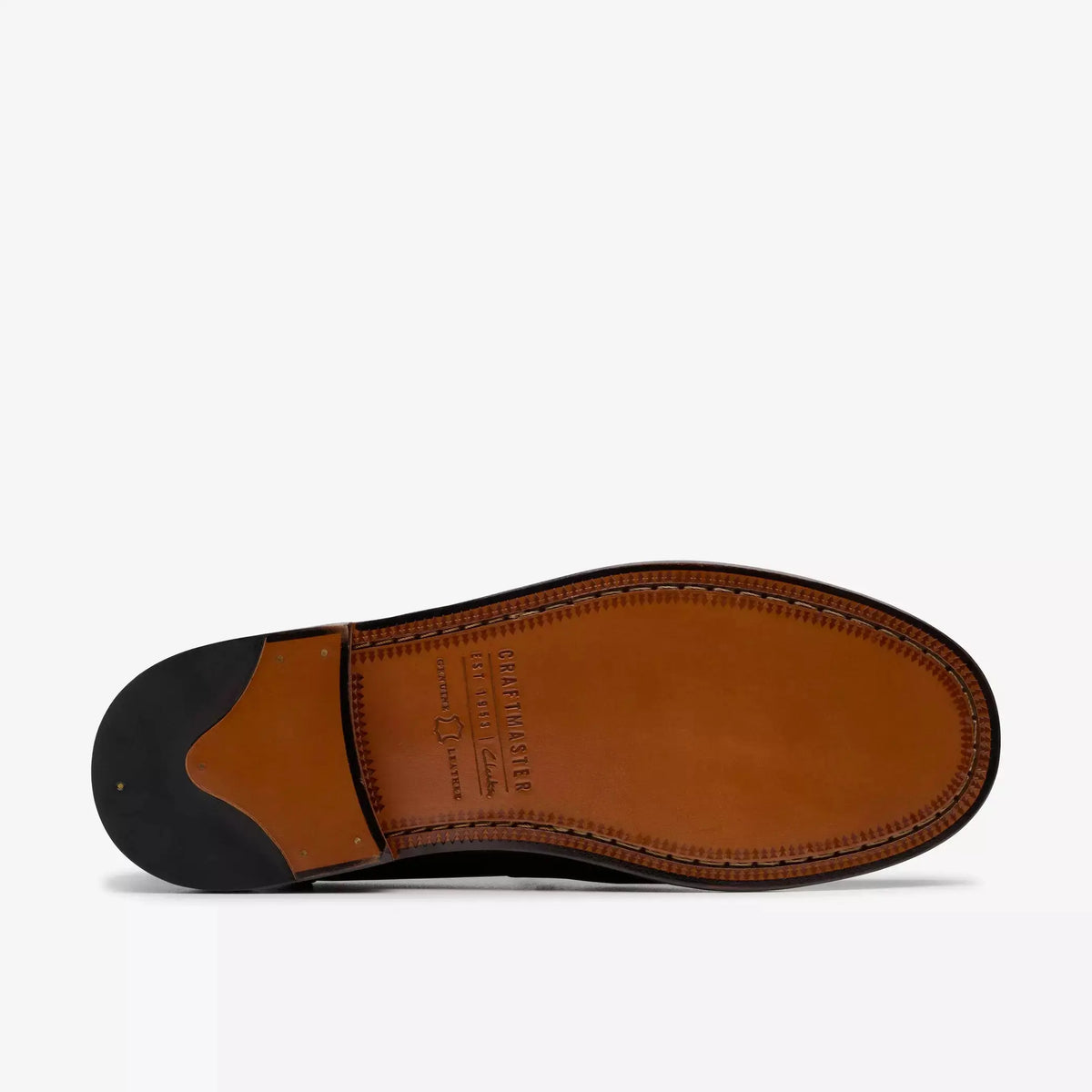 Semelle en cuir cognac du mocassin Craft James Lo, bonbout noir vu de dessous