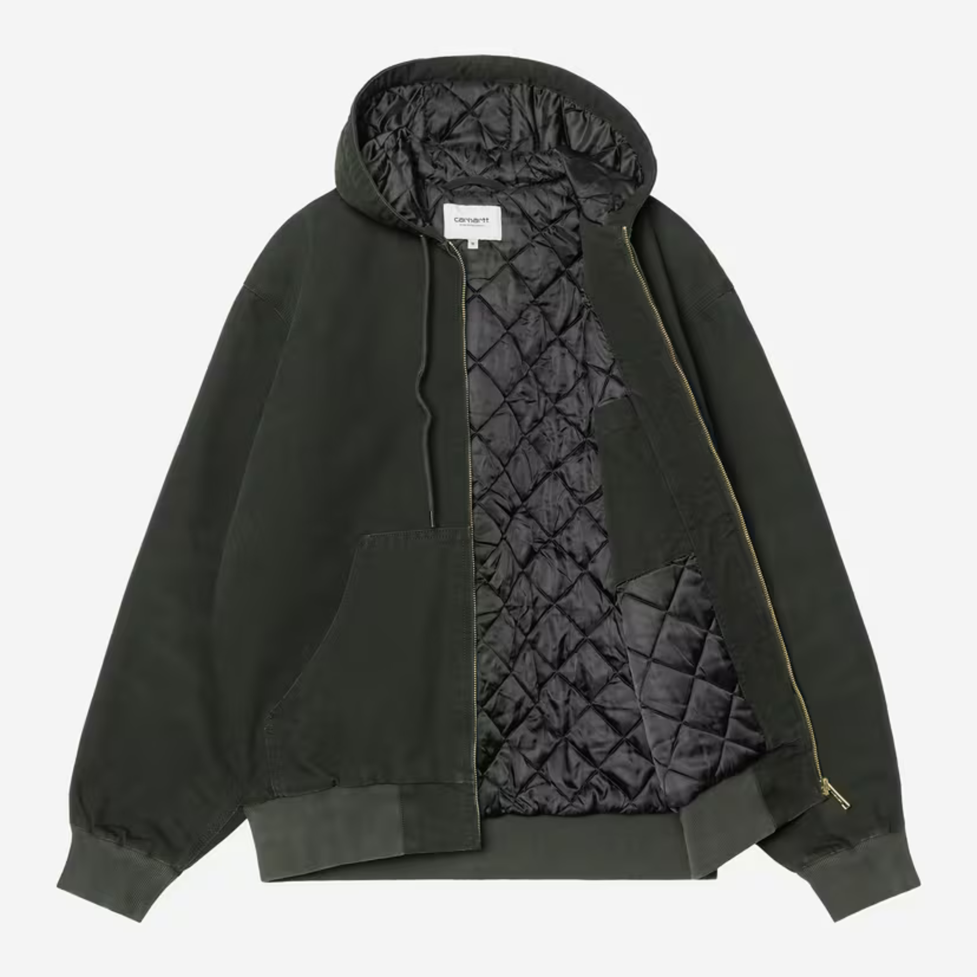 Veste OG Active Carhartt WIP ouverte : doublure matelassée losanges noire, zip laiton, poche kangourou
