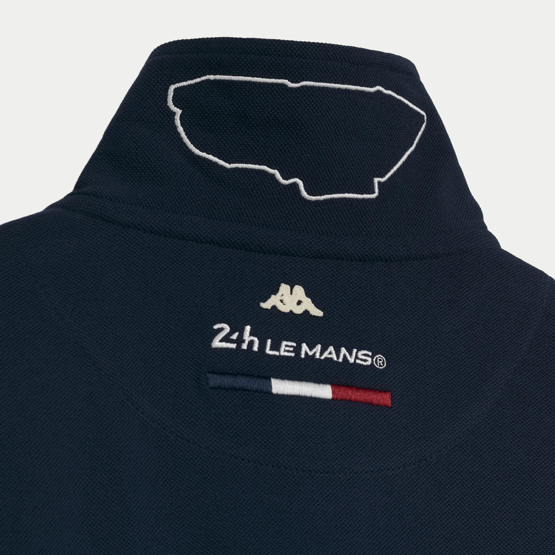 Polo Kappa Fangione 24H Le Mans bleu — détail logos contrastés