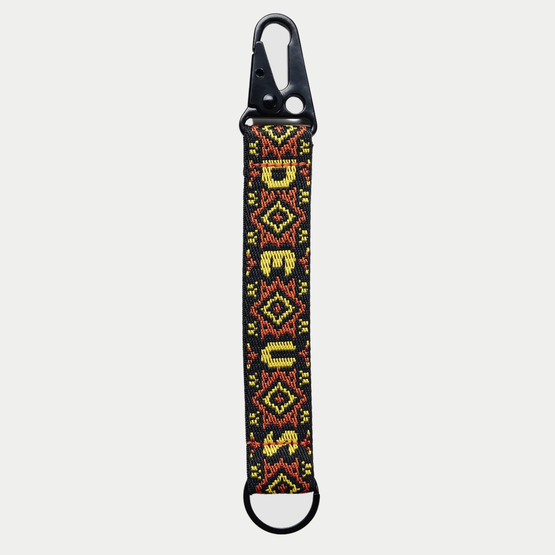 Porte-clés Utah Deus Ex Machina, sangle noire à jacquard rouge brique et jaune d'or, DEUS vertical, mousqueton à ressort, anneau en D