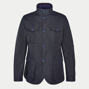 Veste cirée Ogston Barbour marine de face : quatre poches à rabat et col montant à pressions