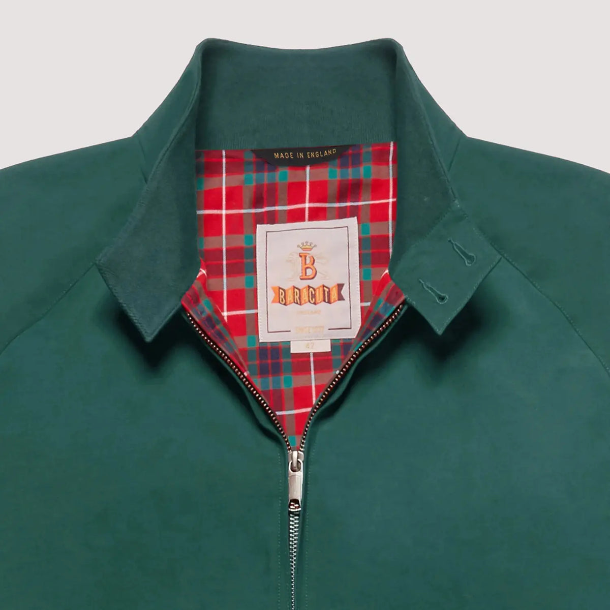 Col du G9 Racing Green ouvert : doublure tartan rouge, verte et bleu nuit, étiquette Baracuta Made in England
