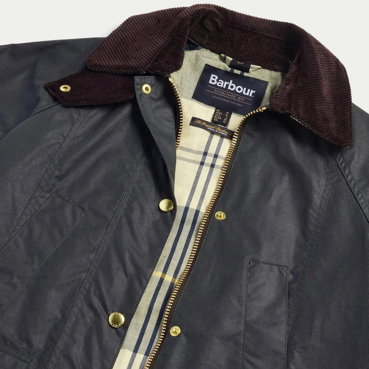 Intérieur de la Veste cirée Barbour Modern Beadnell Sage : doublure imprimée tartan et col velours brun