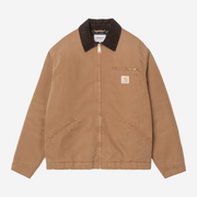 Veste OG Detroit WIP H Brown Stone Canvas Carhartt WIP à plat de face, toile brun caramel et col velours tabac.