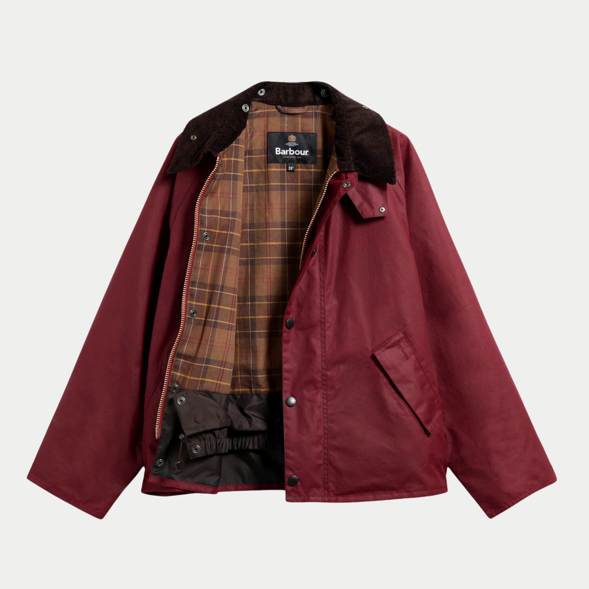 Veste Barbour OS Transport Biking Red ouverte : doublure tartan, zip laiton et jupe pare-vent intérieure