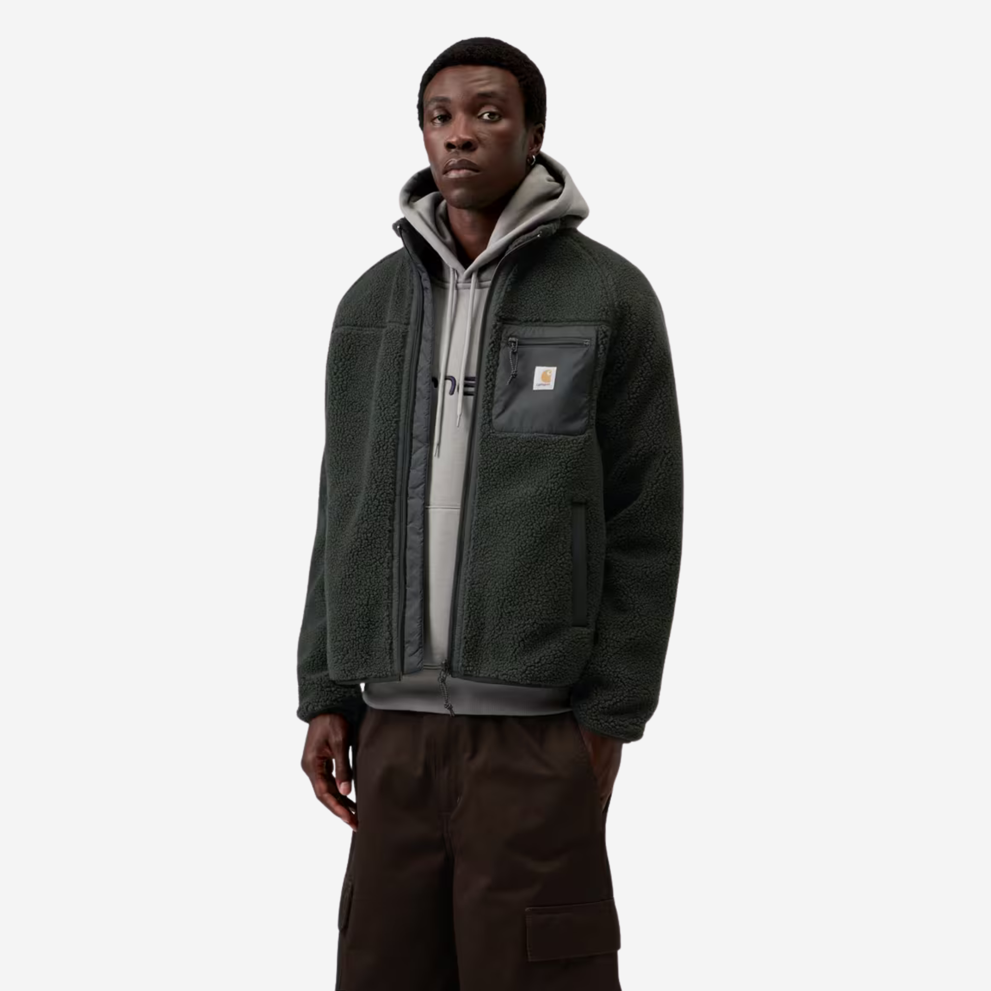 Veste polaire Prentis Raven portée ouverte sur un sweat à capuche gris, vue de trois-quarts.