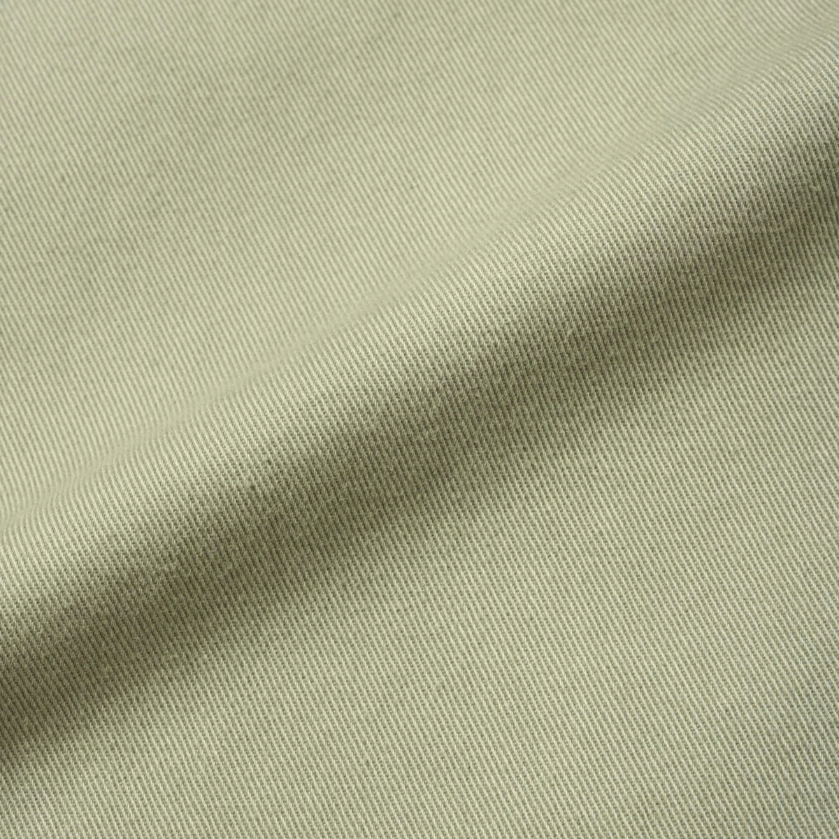 Veste Twill Around Dried Sage Gramicci - gros plan sur le grain du sergé de coton lavé