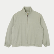 Veste Twill Around Dried Sage Gramicci - packshot face, col montant, zip laiton et découpes courbes du devant