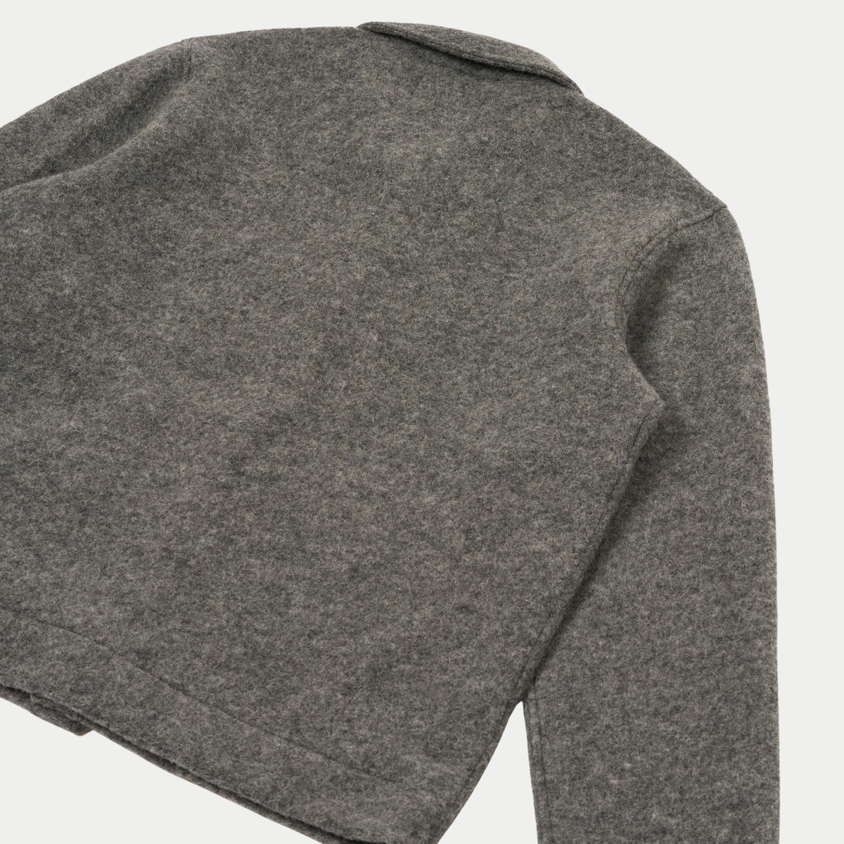 Dos à plat de la veste Uniform gris chiné, épaule, manche et bas droit en Wool Fleece duveteux