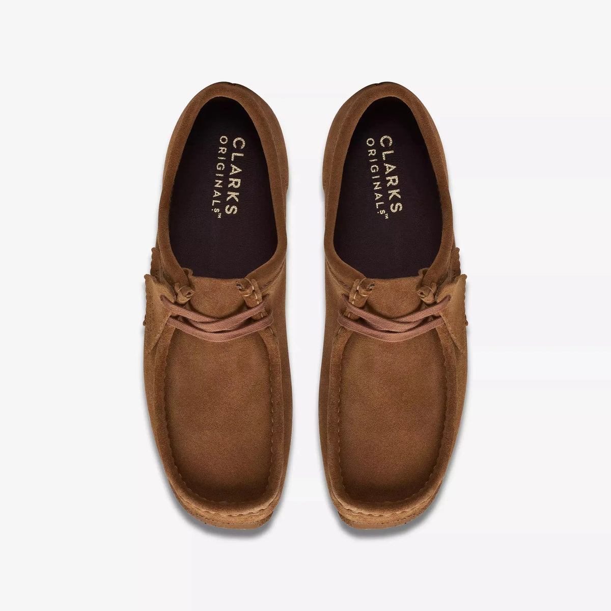 Wallabee Cola vues de dessus, laçage et premières de propreté estampées